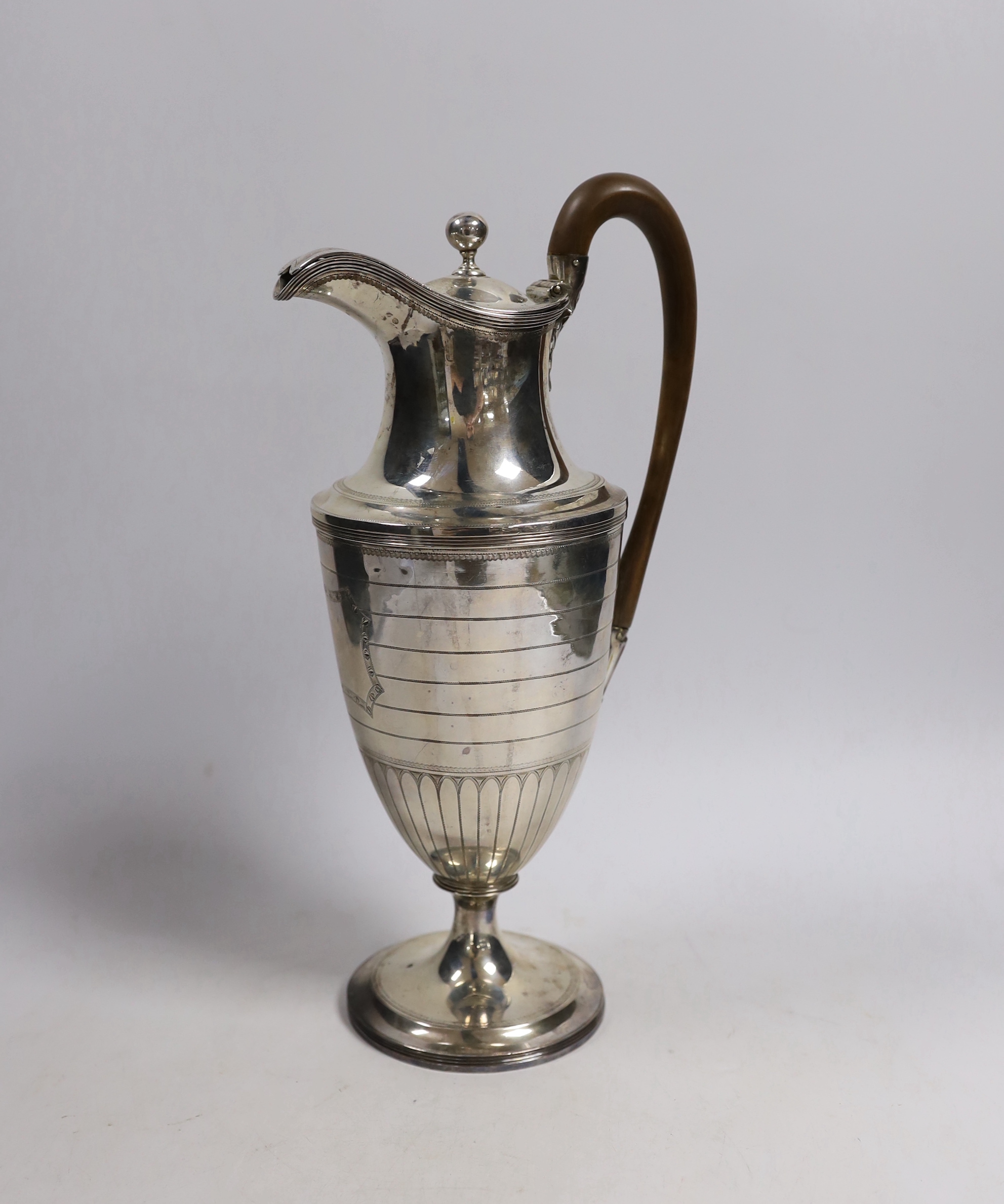 A George III silver hot water pot, London, 1792, by Henry Chawner, height 30.3cm, gross weight 12.8oz.